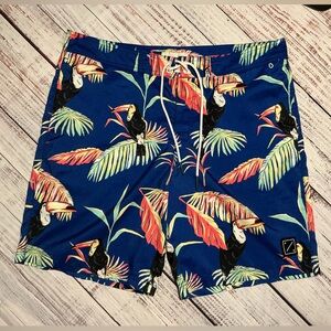 American Eagle men's board shorts in blue with a toucan and tropical. Size XL.